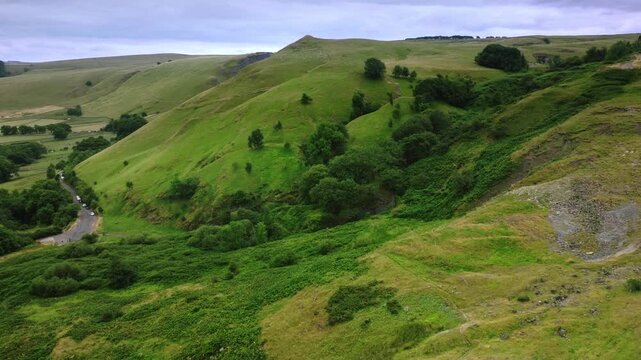 The view of valley with eroded hillside, Peak District, UK