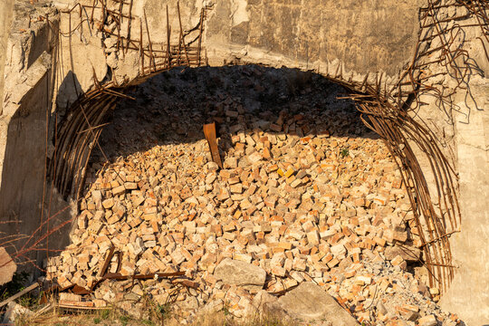 Ruins of an old collapsed factory chimney
