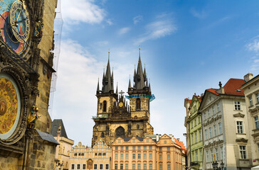 Fototapeta premium Prague Old Town Square with Astronomical Clock in the foreground and Tyn Temple with background