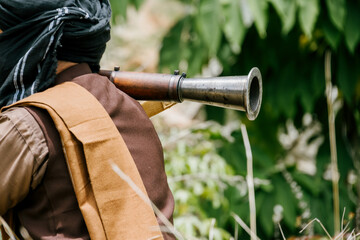 Naklejka premium Armed outdoor soldiers jungle soldiers soldiers on duty alert looking for threat in serious mood during tense mission in tropical forest