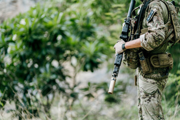 Naklejka premium Outdoor soldiers jungle soldiers soldiers on duty alert focused resilient standing ready prepared watchful professional brave serious tactical