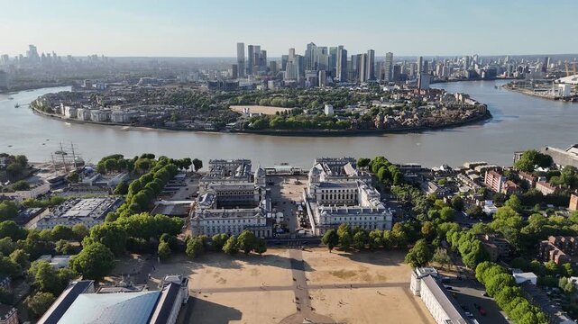 Climate change drought in London aerial view of Blackheath and Greenwich Park with brown grass and Canary Wharf skyline Climate change drought in London an aerial drone view captures Blackheath