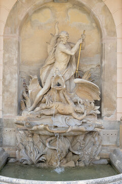 Historic Neptune Fountain with Trident and Mythological Sculptures