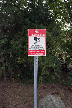 No trespassing sing with camera