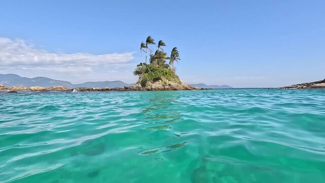 Two lush green islands in the turquoise waters of Angra dos Reis, Brazil