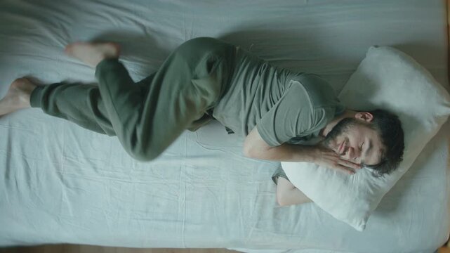 Time Lapse Overhead Man Tossing Turning in Bed Restless Sleep Positions Top View