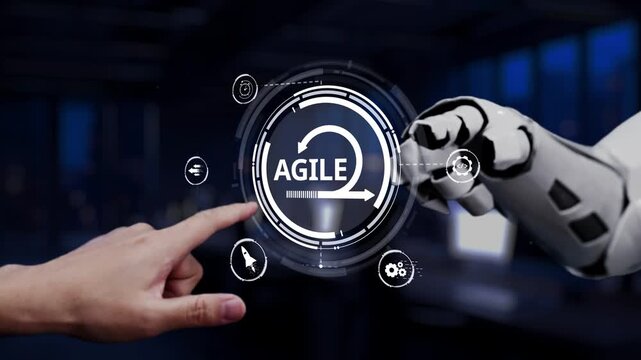 A human hand interacts with a robotic arm showcasing the agile concept in a modern office setting, symbolizing technology and innovation in automation. Synapse