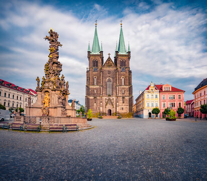 Beautiful summer view of Kostel Nanebevzet&iacute; Panny Marie and Column of Transfiguration. Spectacular evening cityscape of Chrudim town, Czech Republic, Europe. Traveling concept background.