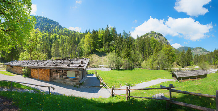 wooden alp huts, roof with rocks, Siebenhutten Kreuth, hiking destination
