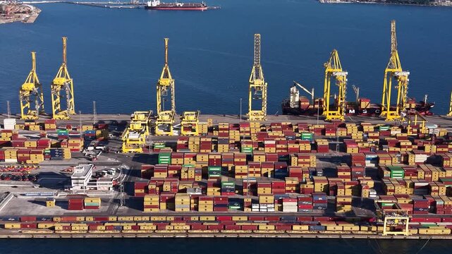 Flight over freight cranes at Trieste Port Container Terminal, Italy