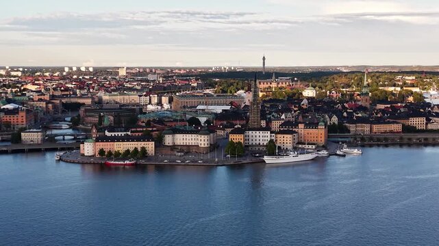 Flight over Riddarholmen island city skyline in Stockholm, Sweden