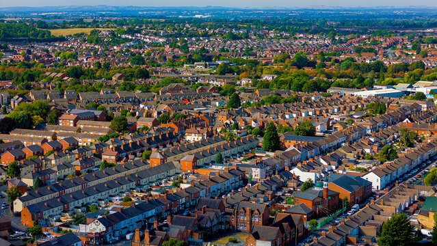 aerial view of dense residential housing and rental real estate district