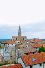 Fototapeta premium Church of Saint Servulus and Old Town Rooftops View in Buje, Istria, Croatia