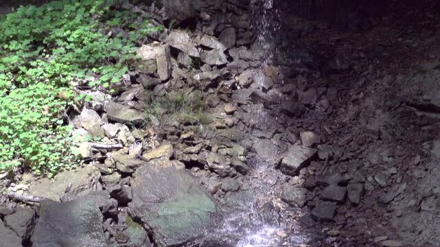 Waterfall in slow motion tilt up.mov