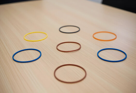 Diversity and inclusion with colorful rubber bands, teamwork and collaboration, business strategy and problem solving