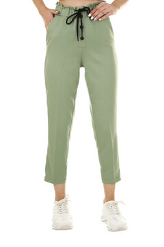 Woman wearing pants in a white studio for e-commerce fashion