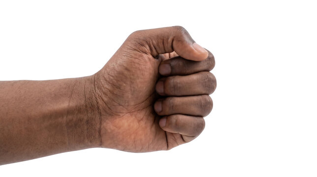 Strong human hand clenched in a powerful fist symbolizing determination courage resilience unity and defiance during protests and demonstrations while expressing strength and solidarity for a
