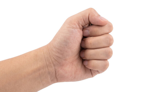 A human hand clenched tightly into a forceful gesture expressing strength and determination during an intense conflict showcasing the power and resilience of the human body in various situations