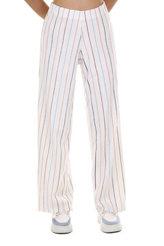 Woman wearing pants in a white studio for e-commerce fashion