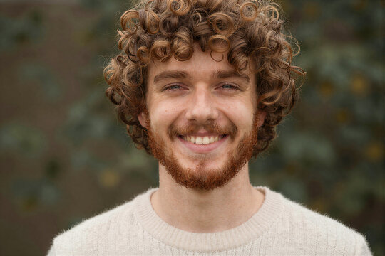 Smiling redhead man portrait