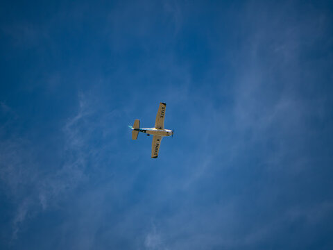 California State Parks airplane flying high in blue sky on August 25 2026 in West Sacramento, California 