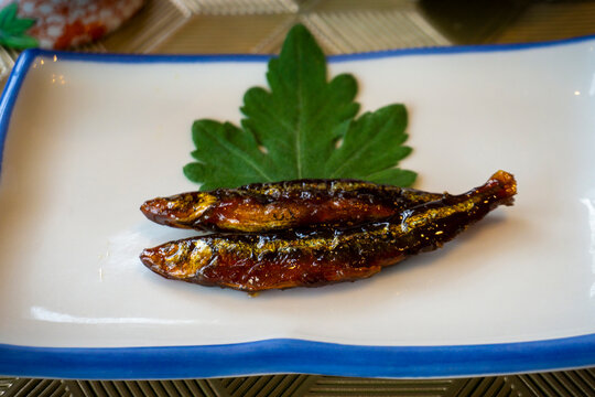 Traditional Hokkaido dish known as Shishamo kanroni, a sweet and savory smelt dish simmered in a sweetened sauce. Shishamo holds deep cultural significance in Hokkaido and Japanese cuisine.