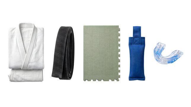 Martial arts equipment set with white judo gi, black belt, tatami mat, blue punch bag and mouthguard on white background