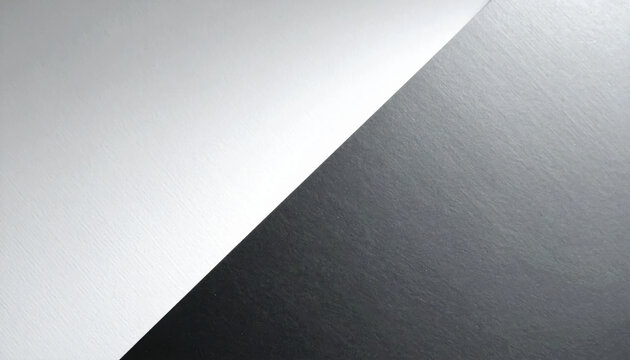 Abstract black and white paper background with diagonal division, contrasting texture, minimal composition, and modern geometric design for creative design use