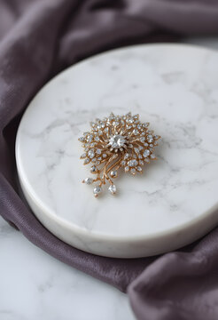 brooch, on marble surface, on velvet cloth, placed delicately