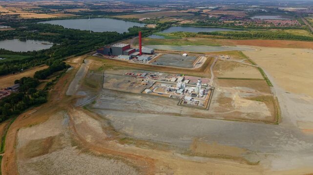 Aerial view of the Rookery South ERF and Millbrook power plant facilities situated in the industrial landscape of Stewartby, England, United Kingdom.