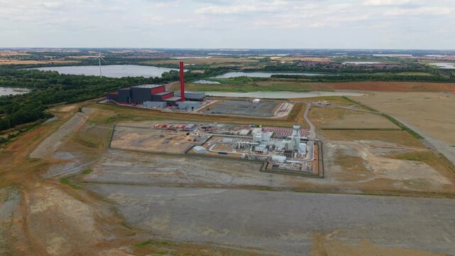 Aerial view of Rookery South ERF and Millbrook power plant situated in the industrial landscape of Stewartby, England, United Kingdom.