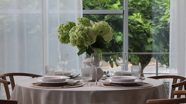 Beautiful place setting with floral decor on table indoors