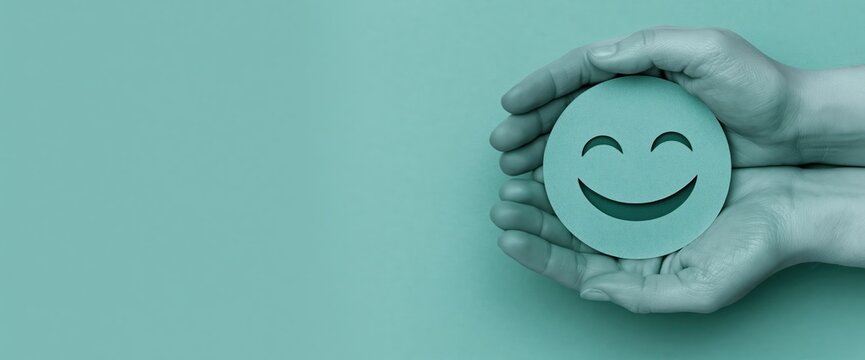Customer hands holding a green smile icon for positive feedback and satisfaction