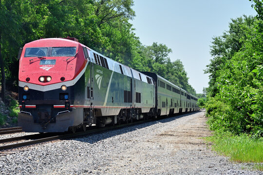 Amtrak's eastbound Texas Eagle roaring through northeastern Illinois in the final miles of its journey to Chicago's Union Station.