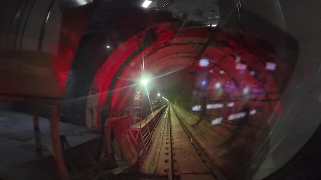 The view from the last coach of a driverless metro train and a video created by reversing the footage.