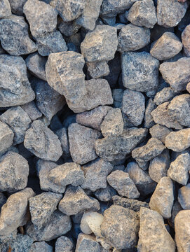 Close Up Texture of Crushed Gravel and Rough Stone Aggregates