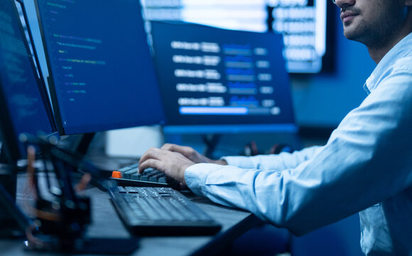 AI engineer, Professional male IT specialist working on software development, programmer typing code for data analytics, Modern technology, Tech Startups, developer and computer programming concept