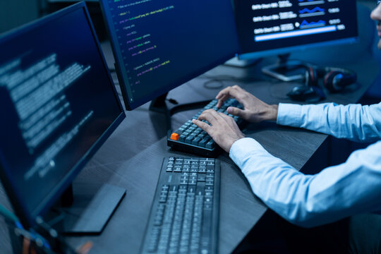 Professional male IT developer working on software development and coding, Programmer analyzing big data for SaaS platform and cybersecurity network, Modern computer technology and business concept