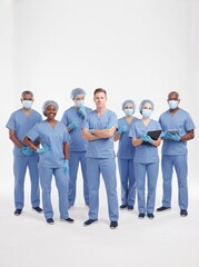 Fototapeta premium Professional Surgical Team on White Background