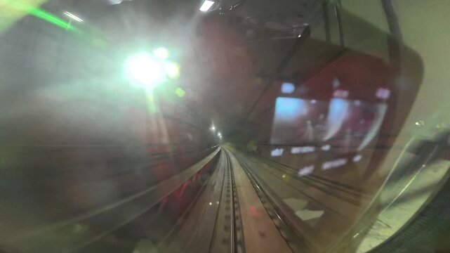 The view from the last coach of a driverless metro train and a video created by reversing the footage.