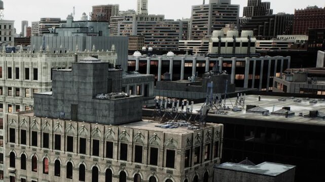 A city skyline shows various buildings, some older and some newer. The scene captures a mix of structures and busy urban life. The image is taken during daylight hours.