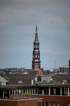 Hamburg, Germany - June 30, 2026: St Catherine&rsquo;s Church, Hauptkirche St. Katharinen, rising above the rooftops of central Hamburg, Germany.