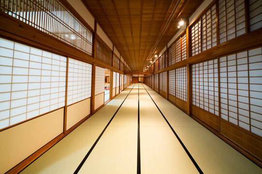 Traditional tatami room with sliding doors and symmetrical interior at Saga, Japan