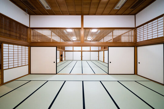 Traditional tatami room with sliding doors and symmetrical interior at Saga, Japan