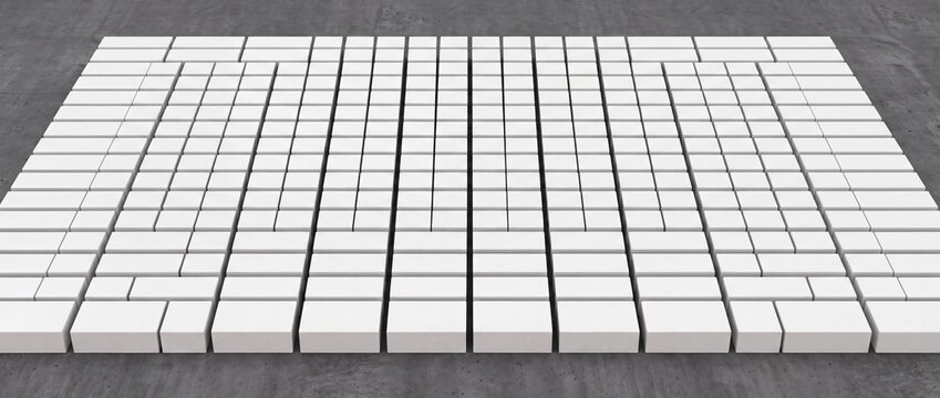 Grid pattern of white rectangular blocks arranged on dark grey concrete floor displaying architectural organization minimal perspective and modular structure.