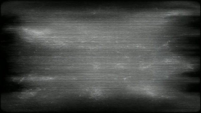 砂嵐状に乱れる白黒のアナログテレビノイズ