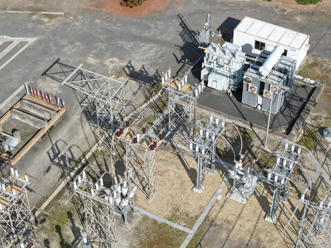 Ferntree Gully, Victoria, Australia - 24 August 2026: Aerial view of Ferntree Gully Zone Substation featuring electrical transformers, metal lattice towers, and power infrastructure.