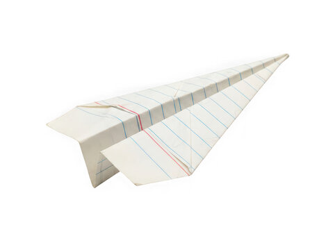 A single paper airplane folded from a sheet of lined notebook paper