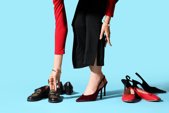 Fashion choice and personal style, woman selecting shoes for outfit, footwear collection on blue background