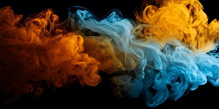 Swirling clouds of orange and blue smoke intertwine against a black background.